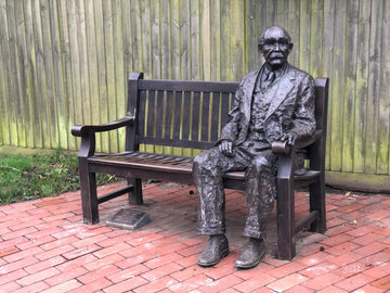 wealden benches at Batemans and Kipling bronze statue