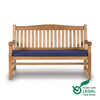 Wooden garden bench with arched back with a blue cushion on a white background, featuring the Green Leaf Legal Teak Wood logo.