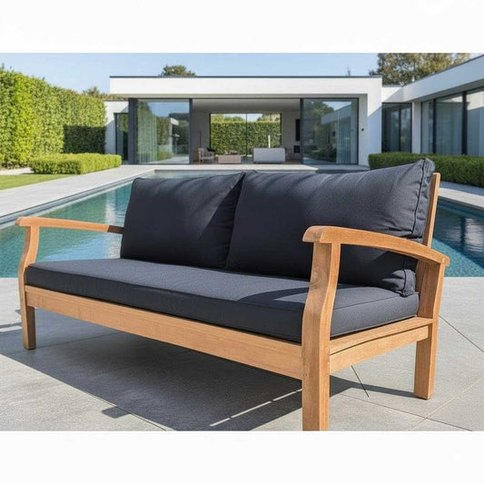 Wooden outdoor sofa with black cushions in a modern garden setting.