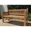 wooden teak garden bench, contemporary architectural design in a garden setting with greenery