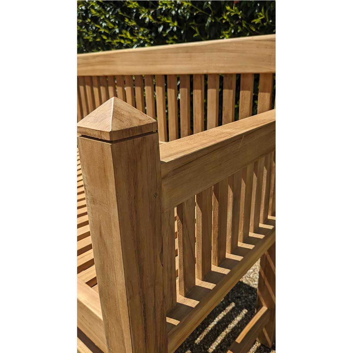 wooden teak garden bench, contemporary architectural design with decorative top post and slatted design