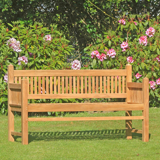 wooden garden bench, 3 seat Yorke, contemporary architectural design, in a garden setting