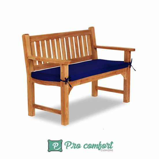 blue cushion on a garden bench