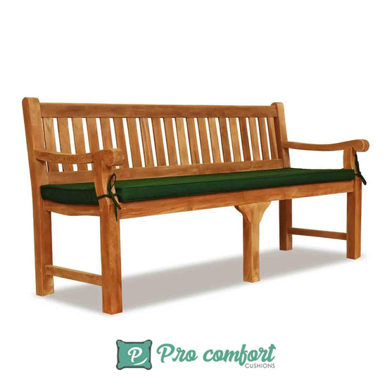 green cushions on an outdoor bench