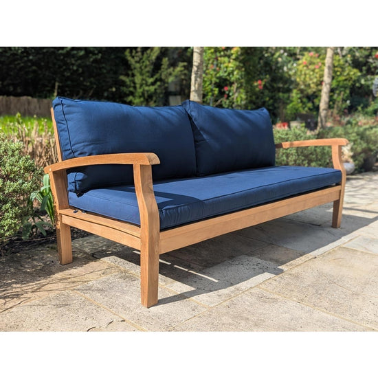 garden daybed with blue cushions
