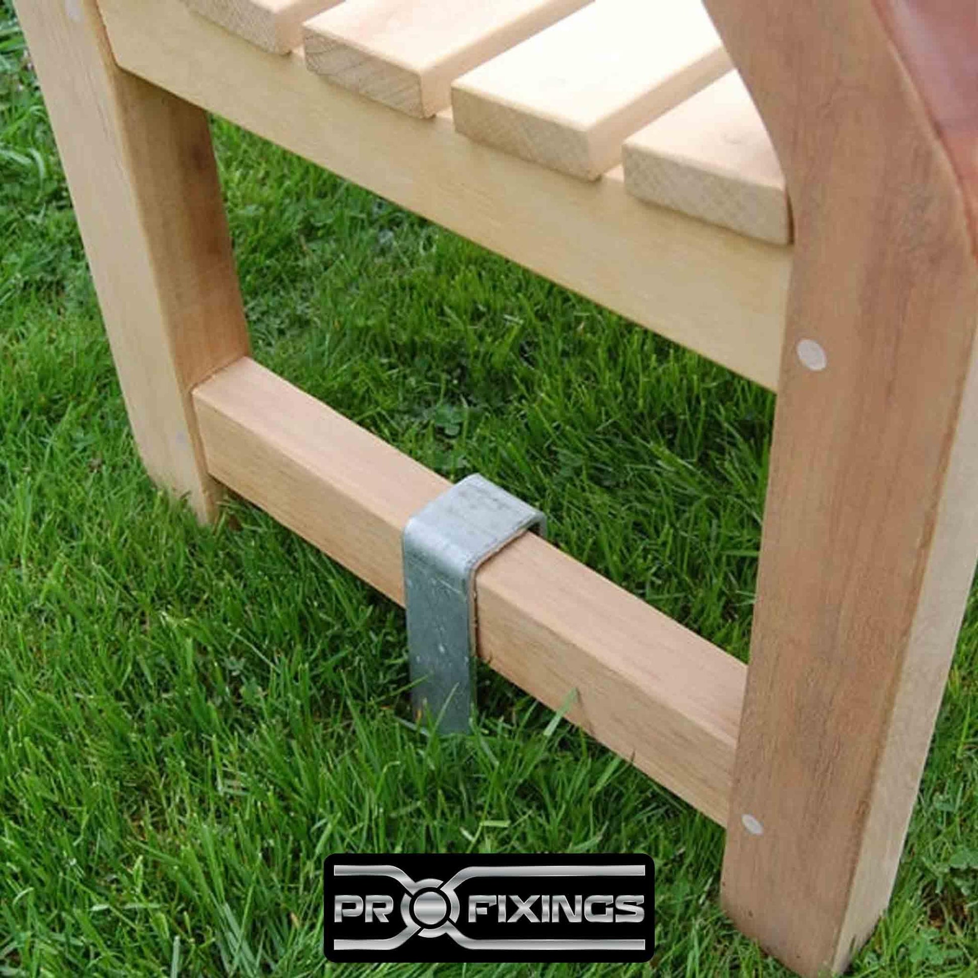 stainless steel bench brace fixing a garden bench in grass