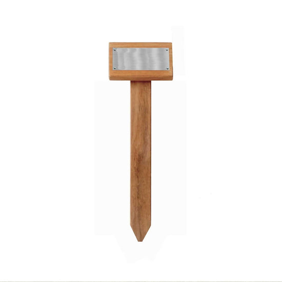Wooden stake, garden marker, with a metal plate on a white background