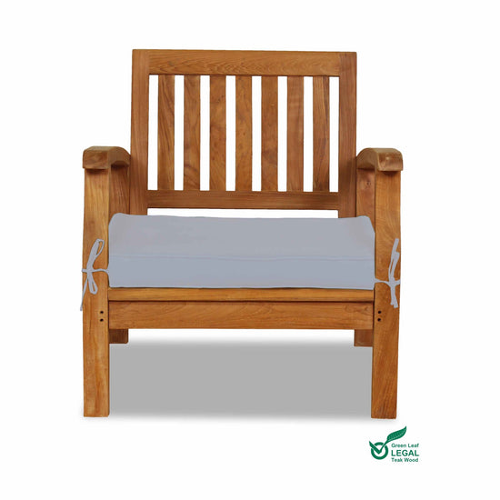 Wooden chair with a white cushion on a white background