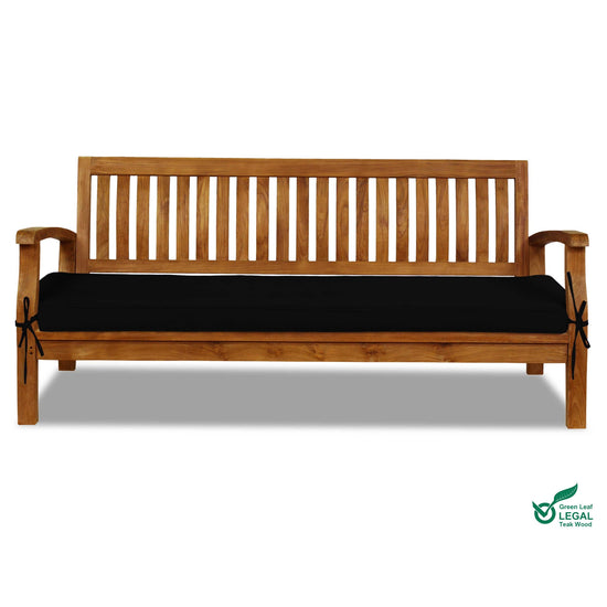 Wooden bench with black cushion on a white background