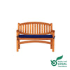 Wooden oval 2 seat garden bench with a blue cushion on a white background, featuring the Green Leaf Legal Teak Wood logo.