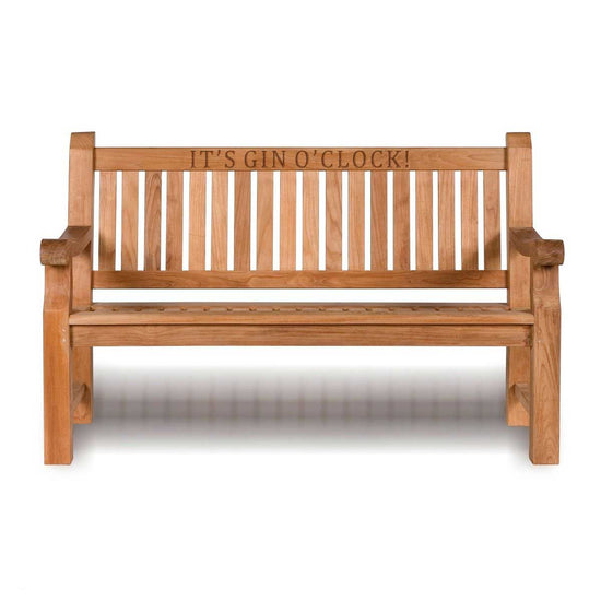 Heavy duty teak wooden bench with 'IT'S GIN O'CLOCK!' engraving on a white background