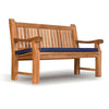 Heavy duty teak wooden bench with a blue cushion on a white background