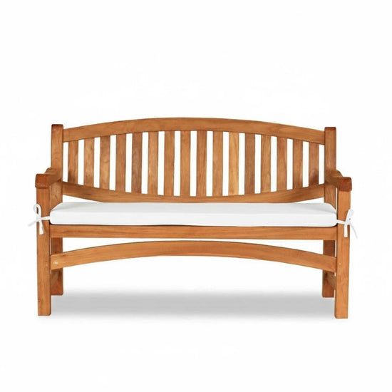 Wooden oval teak garden bench with a white cushion on a white background
