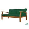 Green daybed with wooden frame on a white background
