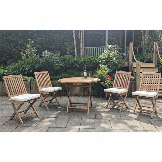 Wooden folding round outdoor table with four matching chairs, white cushions, on a