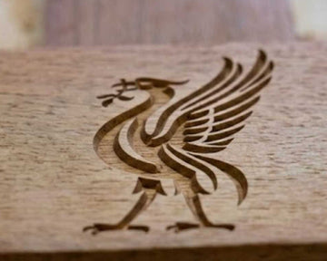 buy garden benches in the UK with carved pictures and football club crests