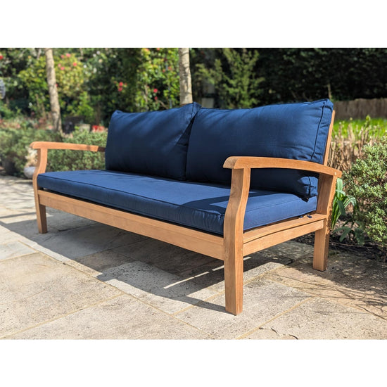 garden daybed with blue cushions