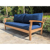 garden daybed with blue cushions